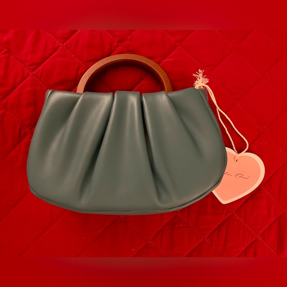 Chic Turqouise Crossbody Bag with Wooden Handle & Crossbody Strap.